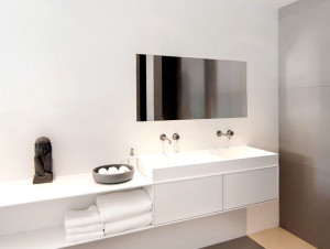 cocoon_minimalist_bathroom_corian_wash_basin_modern_taps_designer